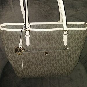 A Real Michael Kors w/care manual. Like New!